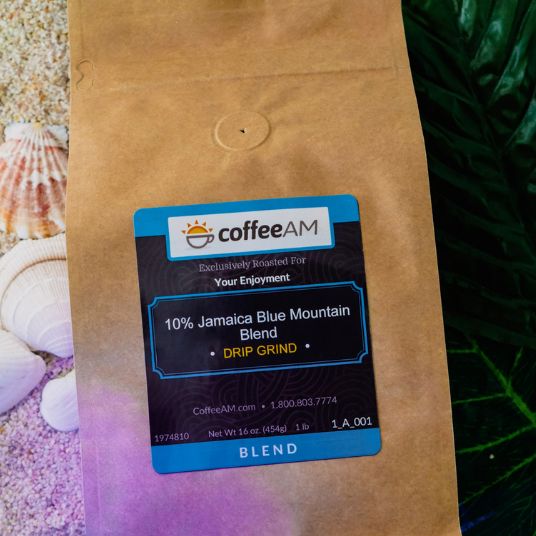 CoffeeAM coffee bag with label on a natural background