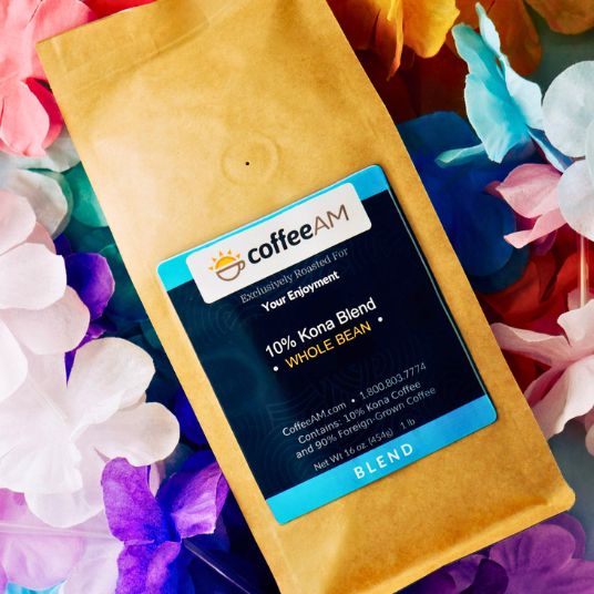 CoffeeAM 10% Kona Blend package with colorful flowers in the background