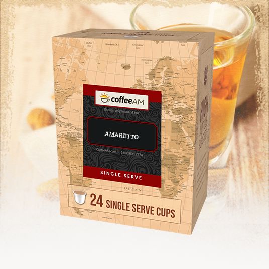 Box of Coffee AM Amaretto single serve cups with a glass of iced coffee in the background.