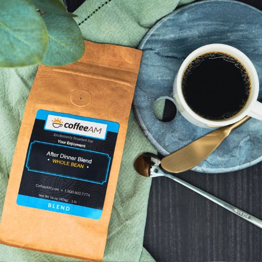 CoffeeAM After Dinner Blend package with a cup of coffee on a plate