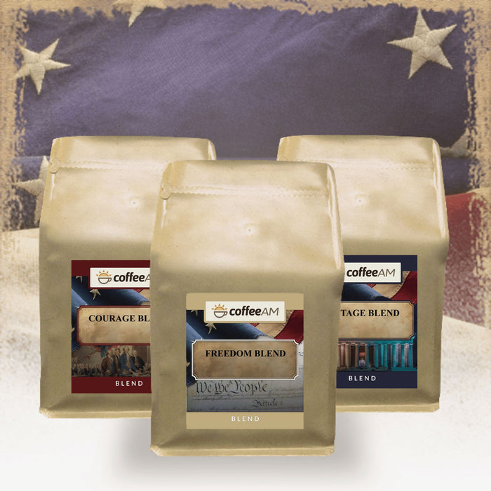 Three coffee bags labeled 'Freedom Blend', 'Courage Blend', and 'Vigilance Blend' with a vintage American flag background.