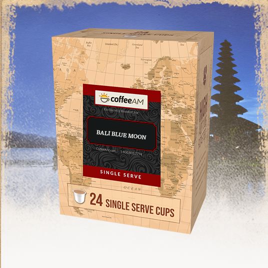 Box of Coffee AM Bali Blue Moon single serve coffee cups with a scenic background