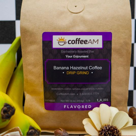 CoffeeAM Banana Hazelnut coffee package with bananas and a flower on a checkered background