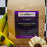 CoffeeAM Banana Hazelnut coffee package with bananas and a flower on a checkered background