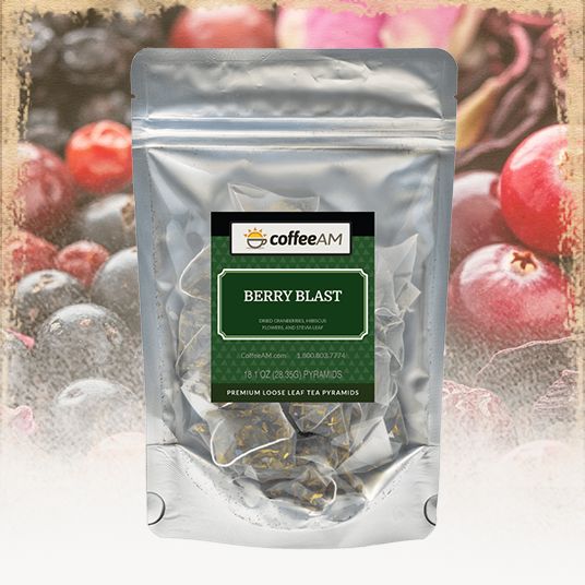 Tea package labeled 'coffee AM Berry Blast' with a background of berries