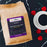 CoffeeAM Black Forest Cake coffee package with a cup of coffee and cherries on a dark background