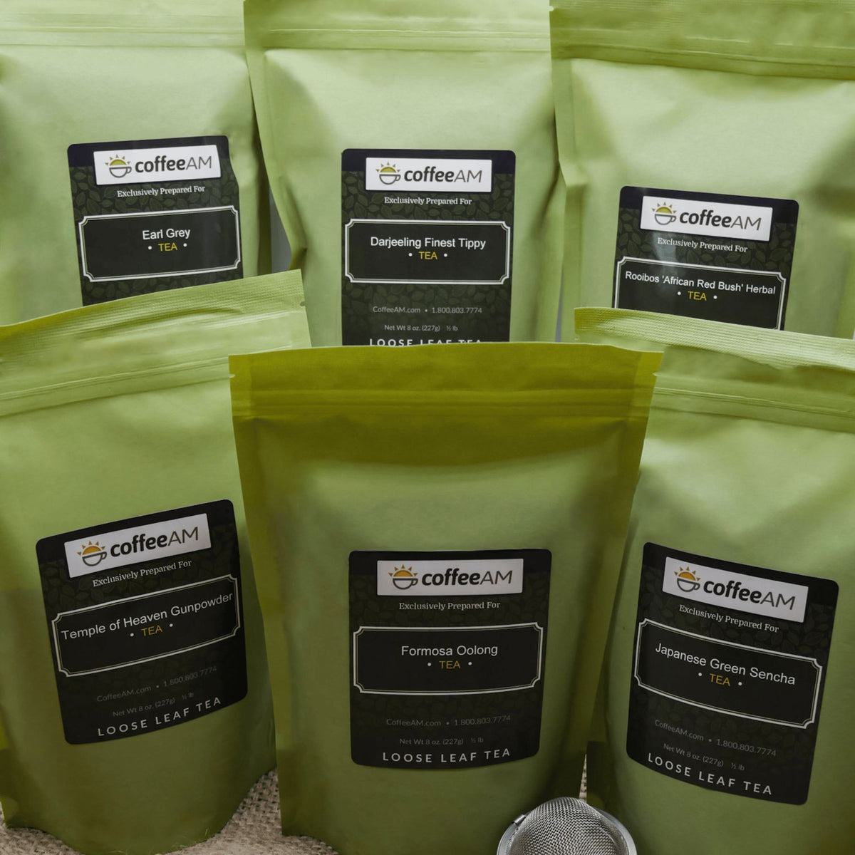 Product image of Gourmet Tea Sampler containing Earl Grey, Darjeeling, Rooibos, Temple of Heaven Gunpowder, Formosa Oolong and Green Sencha.