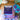 A bag of CoffeeAM Calming Storm drip grind cold brew blend, styled with seashells and a blue floral cocktail umbrella on a turquoise surface.