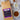 CoffeeAM Caramel Cream Coffee package with a cup of coffee and caramel candies on a marble surface