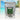 Tea package labeled 'Caribbean Green Tea' with a tropical background