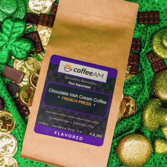 CoffeeAM Chocolate Irish Cream coffee package on a festive background with gold coins and green shamrocks.