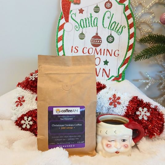 CoffeeAM Christmas Cookies coffee package with a Santa Claus mug and 'Santa Claus is Coming to Town' sign.