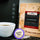 CoffeeAM Bali Blue Moon single serve coffee packaging with a cup of coffee and a coffee machine.