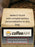 Coffee AM packaging with text overlay on a coffee bean background