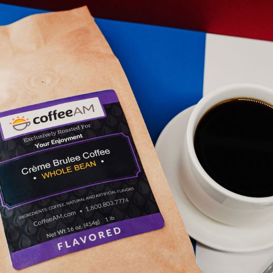 CoffeeAM Crème Brèlee coffee package with a cup of coffee on a colorful background