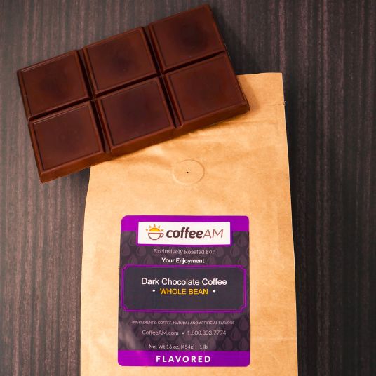 Dark chocolate coffee bars on a coffee AM branded package with a wooden background