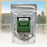 Package of coffeeAM Extra Fancy Green Tea with scenic background