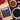CoffeeAM French Caramel Coffee package with two cups of coffee on a red fabric background