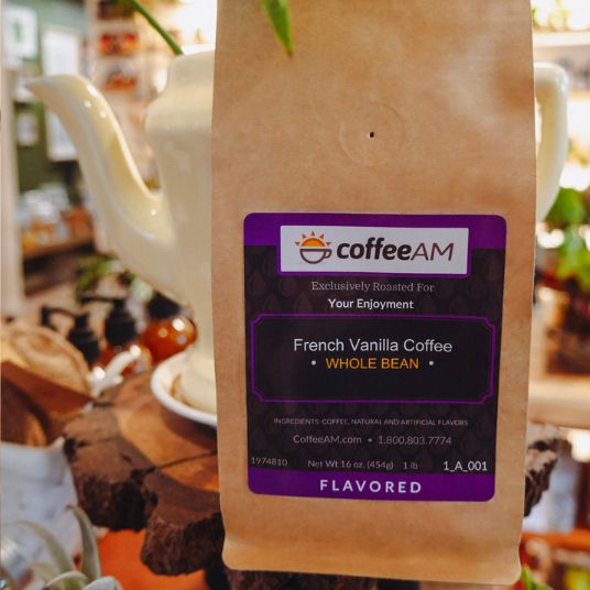 Coffee AM French Vanilla coffee bag on a blurred cafe background