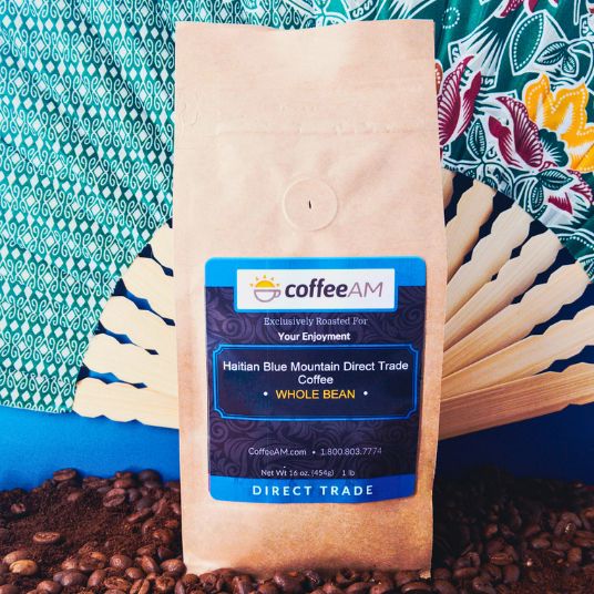 CoffeeAM coffee package with beans and sticks on a patterned background