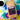 A bag of CoffeeAM Hawaiian Hazelnut Coffee French Press flavor, styled in a flat-lay with a white coffee cup of black coffee and colorful artificial flowers on a mint green background.