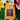Hawaiian Kona Coffee Reserve Blend package with flowers and leaves in the background