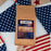 CoffeeAM Heritage Blend package on an American flag background