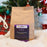 Kraft paper coffee bag with a purple label featuring 'coffeeAM' brand on a festive background.