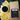 A kraft paper bag of coffeeAM Jamaican Rum Coffee sits next to a white cup of black coffee, surrounded by yellow corn husks and green palm leaves on a dark blue surface.