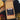CoffeeAM Java Dutch Estate coffee bag with decorative elements on a dark background
