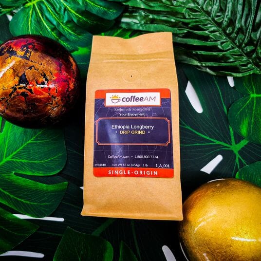 Coffee AM Ethiopia Longberry coffee package on a leafy background
