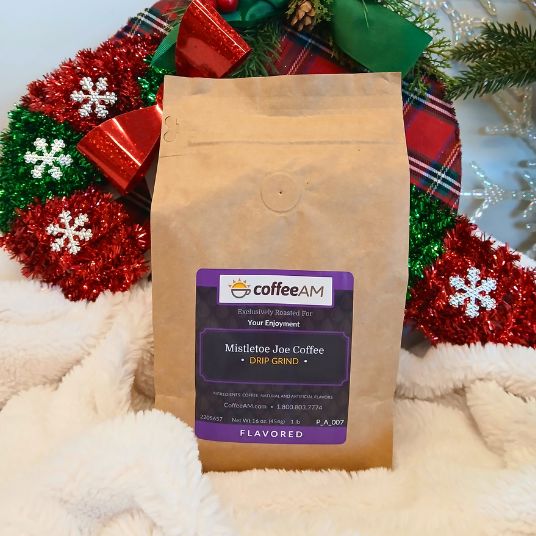 CoffeeAM Mistletoe Joe Coffee package with Christmas decorations in the background