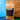 CoffeeAM Organic Bali Blue Moon coffee package on a textured surface with a blue gradient background