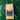 CoffeeAM Organic Espresso whole bean package on a green leaf background
