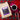 A bag of CoffeeAM Peppermint Coffee sits on a red plaid blanket next to a white cup of black coffee on a magenta tray, with a red gift box and candy canes nearby.