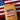 Bag of Raspberry Cream flavored coffee with a label on an American flag background