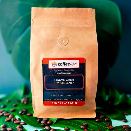 CoffeeAM Suwesi Coffee package on a leaf with coffee beans