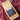 CoffeeAM Sumatra Black Satin coffee package on a patterned fabric background