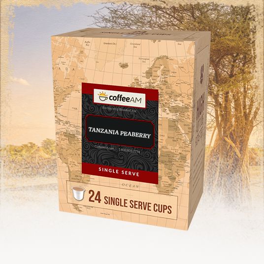 Box of Coffee AM Tanzania Peaberry single serve coffee cups with a scenic background
