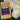 Coffee AM toasted coconut macaroon coffee package with a floral mug on grass