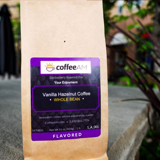 CoffeeAM vanilla hazelnut coffee package with a blurred outdoor background