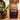 CoffeeAM vanilla nut coffee bag with a plant in the background